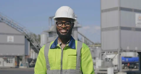 Afro factory worker looking at camera Stock Footage 114330772
