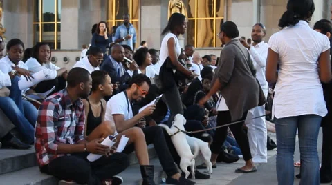 Afro French against backdrop Eiffel Tower Stock Footage 4540921
