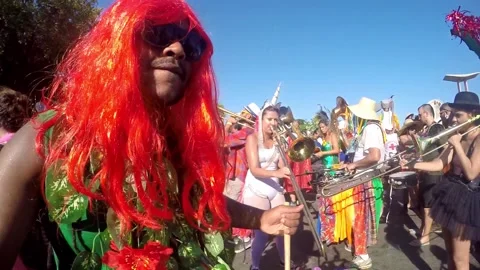 Afro Man Poison Ivy Playing Drums Street Carnival Parade Rio de janeiro Brazil Stock Footage