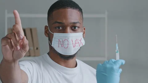 Afro young guy patient sick black man wears protective medical mask with Stock Footage 155597448