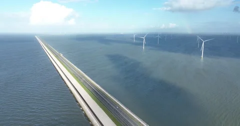 The Afsluitdijk flood defense system in the Netherlands between North Holland Stock Footage 220094208
