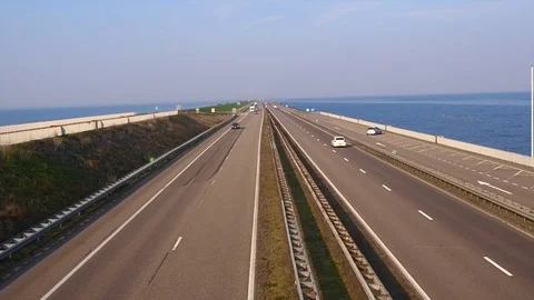 Afsluitdijk traffic in the Netherlands Stock Footage 106011513