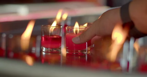 After asking for blessings a lighted candle was placed. Stock Footage 282381963