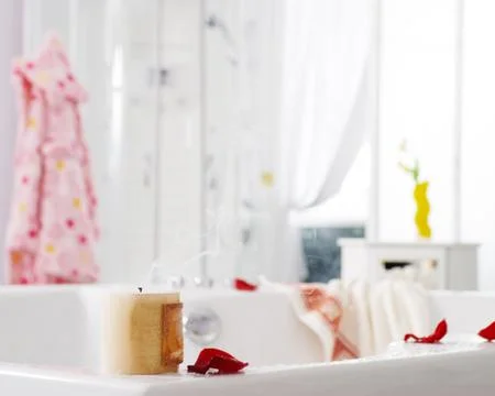 After bath - close up of bathroom interior with short focus on the rose petal Stock Photos