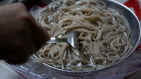 After boiled Zaru Soba (Cold Soba Japanese Noodles food style) in hot water. Stock Footage 89762420