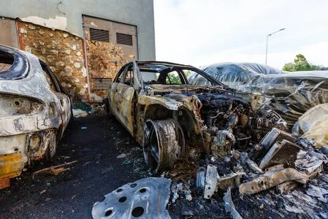 After bombing. Russian army burned cars, dwelling houses and killed people in Stock Photos