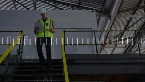 After checking papers supervisor descending stairs consulting papers for safety, Stock Footage 332505017