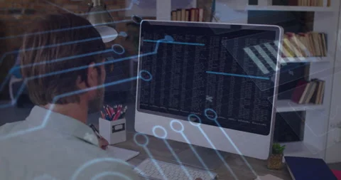 After code display engineer observing screen while circuit lines sliding across Stock Footage 311916134