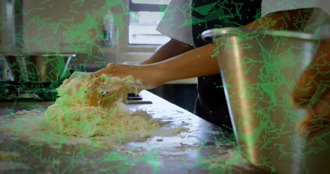 After combining flour chef apprentice pressing and folding dough on kitchen Stock-Footage 318045882