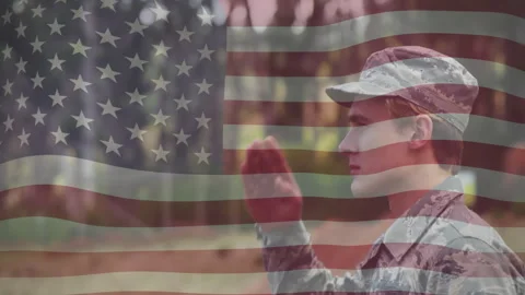 After command Air Force soldier raising hand saluting waving flag for military Video stock 313294262