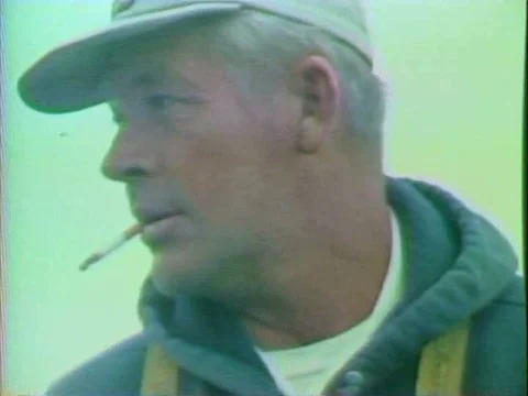 After an efficient day's work, father and son oyster fishermen prepare their Stock Footage 75008869