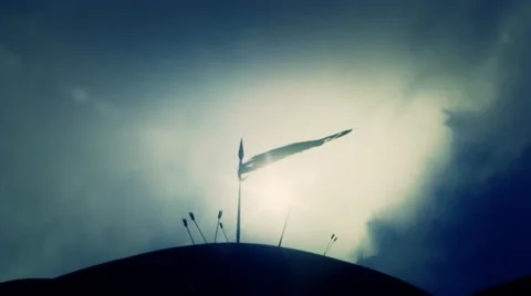 After an Epic Battle Waving flag on a Spear with Arrows on the Ground Stock Footage 43359000