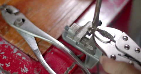 After grinding use locking pliers and a screwdriver to try to pry it off. Stock Footage 311092717