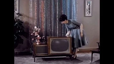 After having watched television, should you wish to, you can hide the TV back in Stock Footage 85767411