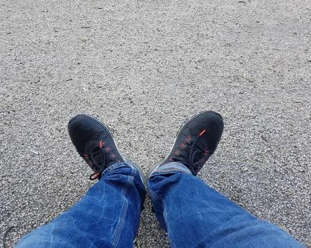 After a long walk kicking my feet out. Stock Photos