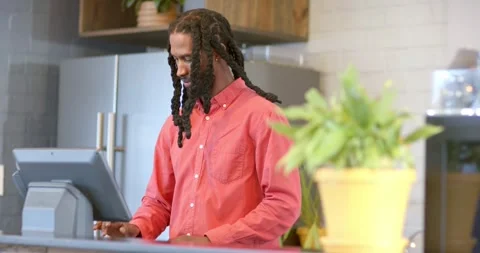 After order African American man tapping swiping register in cafe processing Stock Footage 341932002