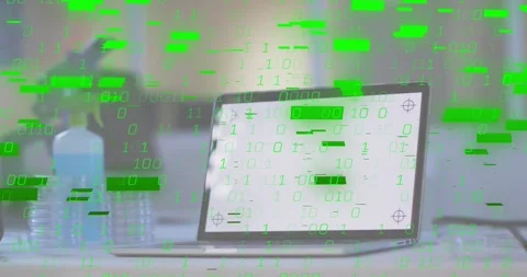 After pause binary digits emerging on laptop screen spreading across desk to Video stock 318626433