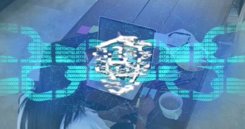After pause woman at table using laptop, overlay code forming shield padlock for Stock Footage 329836210