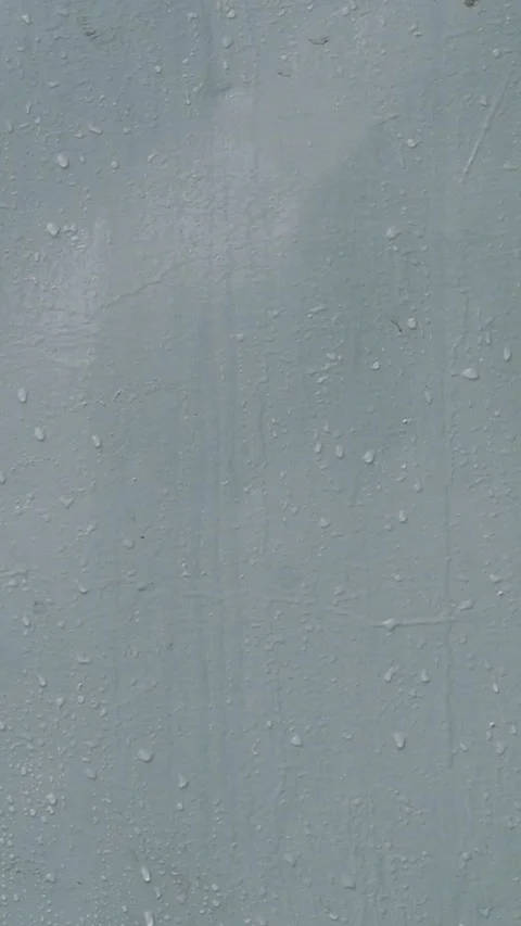After Rain Water Droplets Sliding Down On Metallic Surface - Vertical Footage Stock Footage 340851914