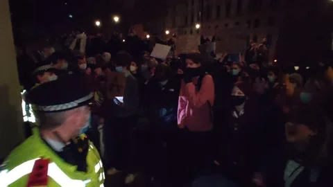 AFTER SARAH EVERARD MURDER PROTESTERS YELL 'WHO DO YOU PROTECT WHO DO YOU SERVE' Stock Footage 150401831