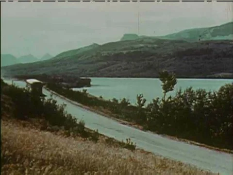 After Shirley and the Professor's bus breaks into ?She'll be coming ?round the Stock Footage 79466114