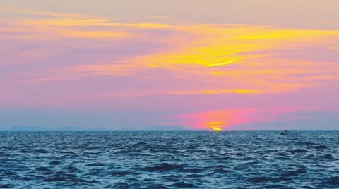 After the sunset on the beach with boat on the waves Stock Footage 67094205