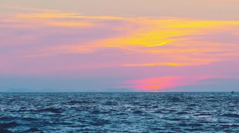 After the sunset on the beach with boat on the waves Stock Footage 67094210