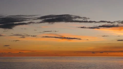 After sunset in the evening, the colorful clouds on the sea covered the sky 스톡 동영상 132082263