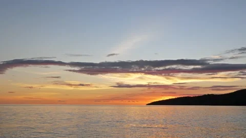 After sunset in the evening, the colorful clouds on the sea covered the sky 스톡 동영상 132082335