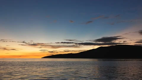 After sunset in the evening, the colorful clouds on the sea covered the sky 스톡 동영상 132082582