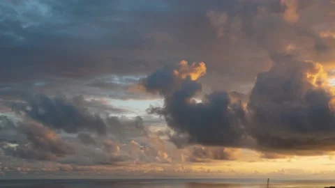After sunset in the evening, the colorful clouds on the sea covered the sky 스톡 동영상 142246853