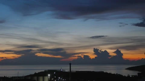 After sunset in the evening, the colorful clouds on the sea covered the sky 스톡 동영상 142246976