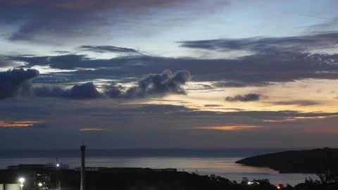 After sunset in the evening, the colorful clouds on the sea covered the sky 스톡 동영상 142247043