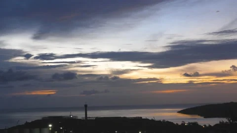 After sunset in the evening, the colorful clouds on the sea covered the sky 스톡 동영상 142247128