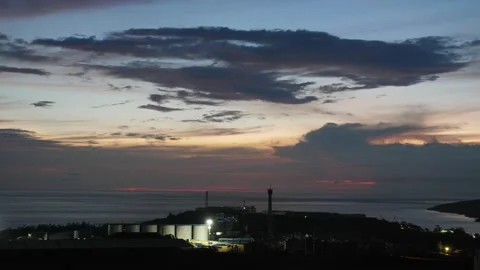 After sunset in the evening, the colorful clouds on the sea covered the sky 스톡 동영상 142247191