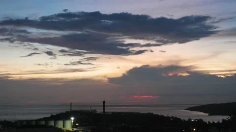 After sunset in the evening, the colorful clouds on the sea covered the sky 動画素材 142247463
