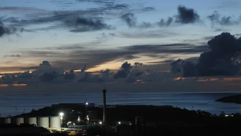 After sunset in the evening, the colorful clouds on the sea covered the sky 動画素材 142247537