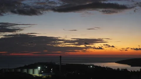 After sunset in the evening, the colorful clouds on the sea covered the sky 動画素材 142247573