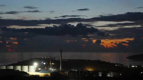 After sunset in the evening, the colorful clouds on the sea covered the sky 動画素材 142247693