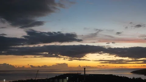 After sunset in the evening, the colorful clouds on the sea covered the sky Stock Footage 142247735