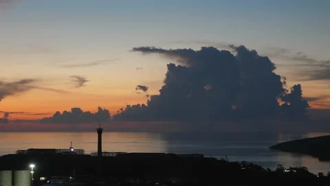 After sunset in the evening, the colorful clouds on the sea covered the sky 動画素材 142248310