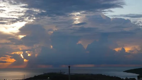 After sunset in the evening, the colorful clouds on the sea covered the sky 動画素材 142248756