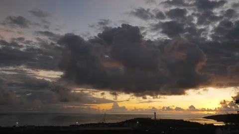 After sunset in the evening, the colorful clouds on the sea covered the sky 動画素材 142248830