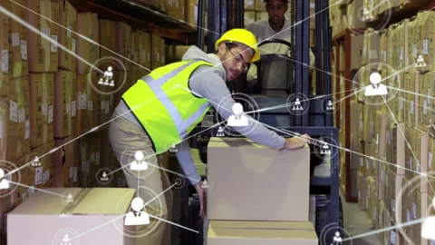 After three boxes loaded, worker stacking, operator aligning forks, tech icons Stock Footage 309872568