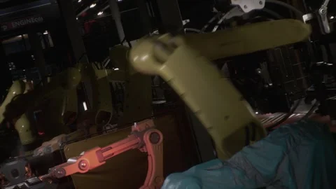 After using robots manufacturers are starting to deploy 'cobots' on their sh Stock Footage 290291680
