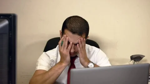 After a very busy day, the worker decides to stop working Video stock 73363053