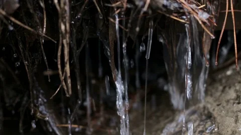 After the winter snow is melting, the flow of water Stock Footage 72860454