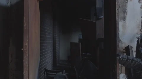 Aftermath of a building that was destroyed in a fire Stock Footage 148187081