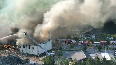 Aftermath of the explosion due to propane leakage, Fire and massive smoke Stock Footage 245819902