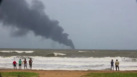 Aftermath of explosion on Singapore-flagged container vessel off Colombo, Sri La Stock Footage 204037280